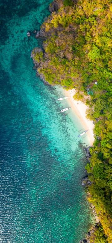 Sandy beach overlooking the crystal clear sea