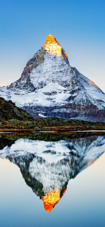 The reflection of the Golden Mountain in the Sunlight
