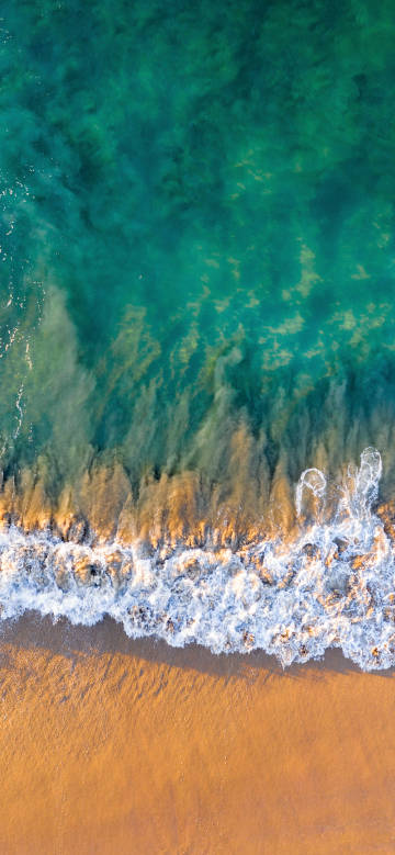 Sparkling Water Overflows Sand