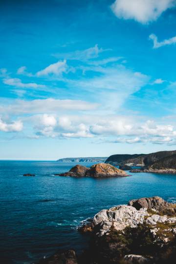 Seaside reefs under clear sky