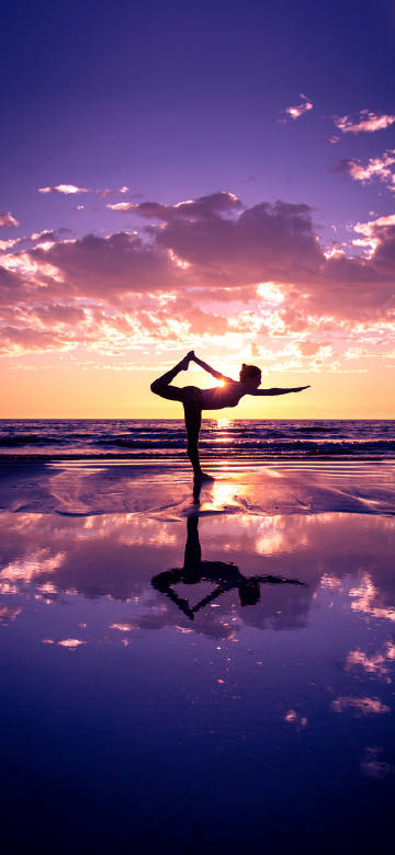 Yoga at beach sunset