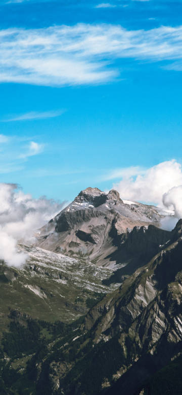 Magnificent Peaks Enshrouded in Clouds
