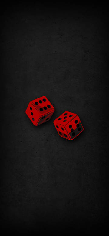 Red dice on black background