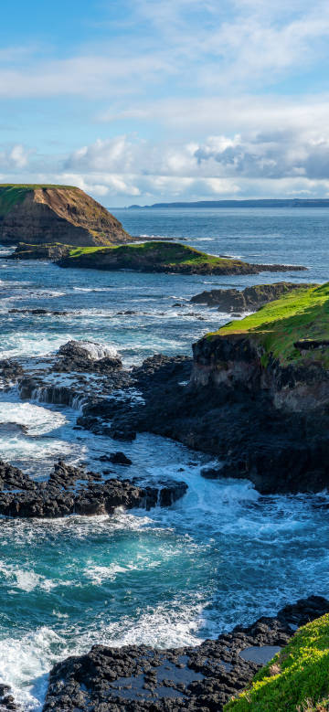 Waves crashing on rocky coast