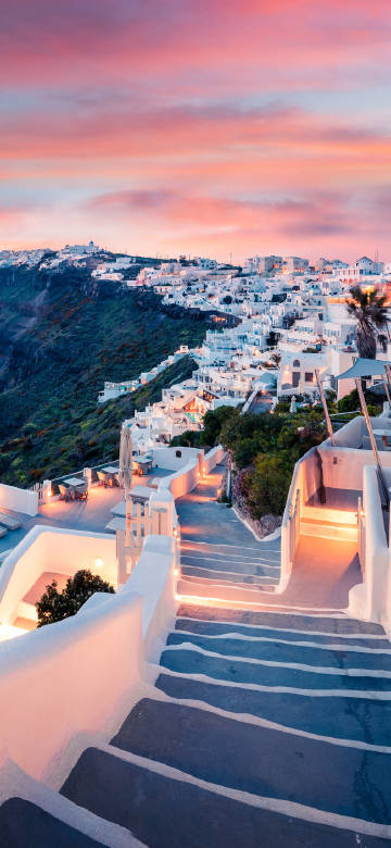 Town of white buildings at dusk