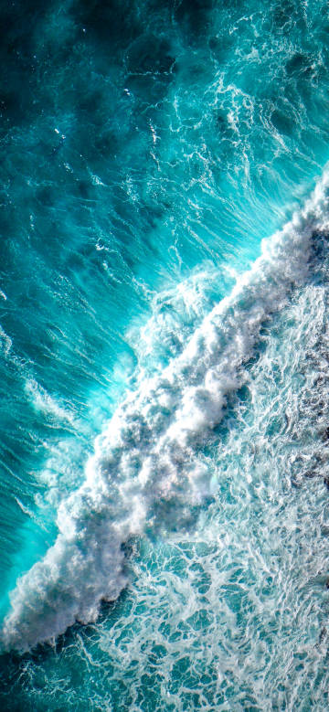 Blue sea, white waves