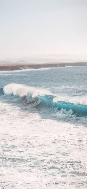 Waves Surging by the Coast