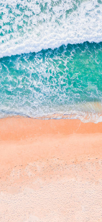 Orange beach by the sea