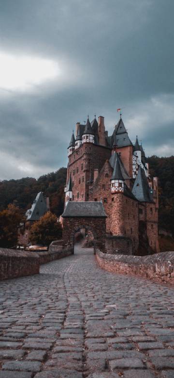 Eltz Castle in Germany under a cloudy sky