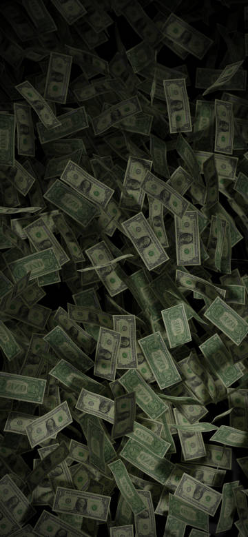 Dollar bills falling through the air