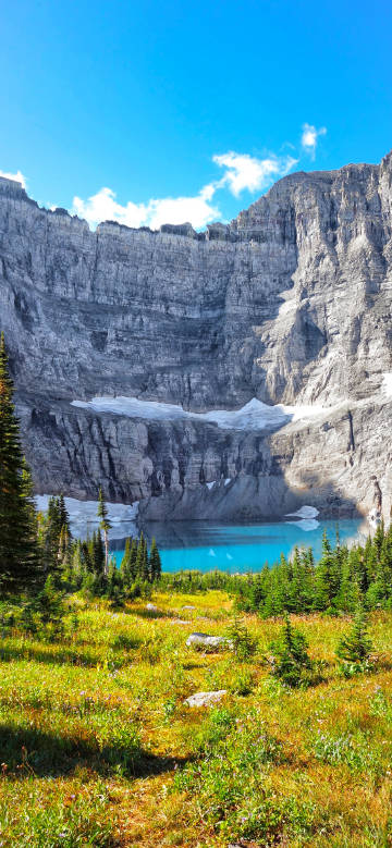 Blue lake under the rock