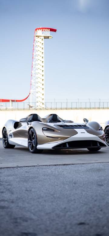 Futuristic sports car beside the race track