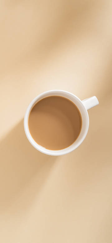 Cup of coffee on minimalist background