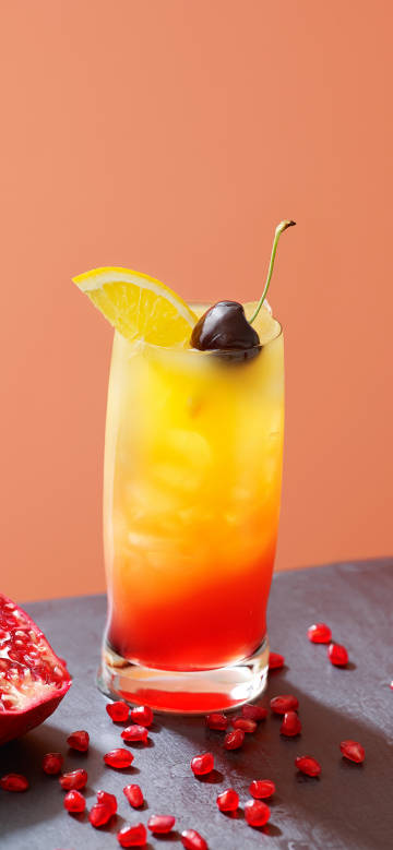 Colorful mixed fruit juice with summer flair