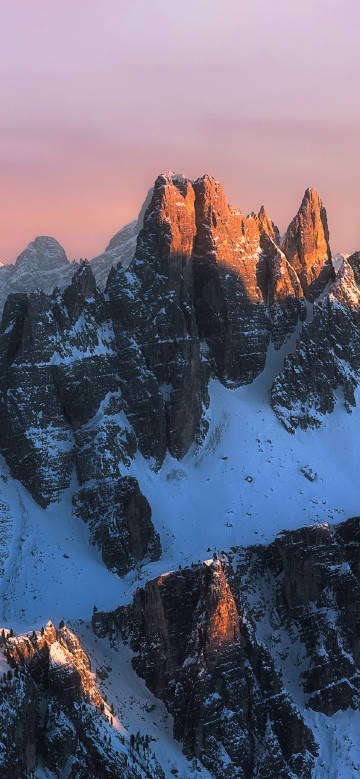 Magnificent snow-capped mountains at sunset