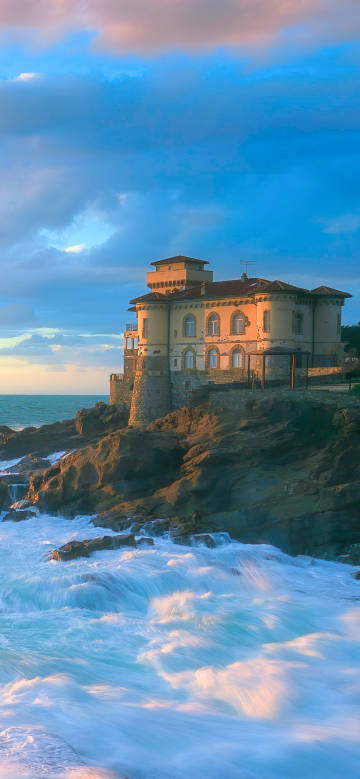 Ancient buildings standing on the cliffs by the sea