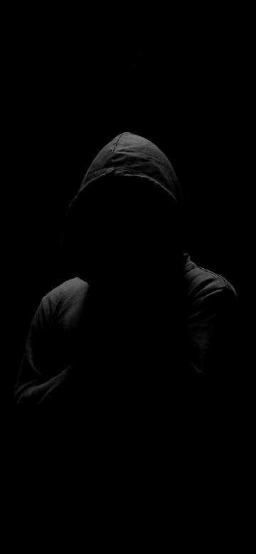 Mysterious dark figure in hood