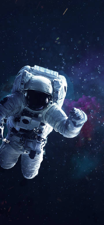 Astronaut floating under the starry sky