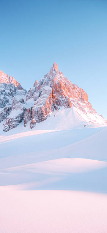 Magnificent snow-capped mountain in the sun