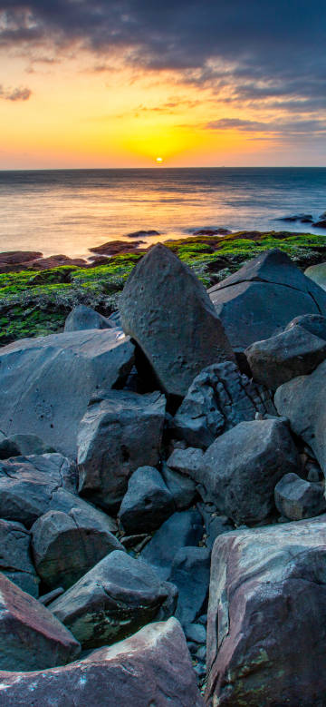 Coastal Rocks under Sunset