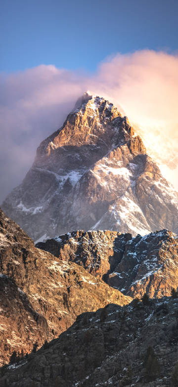 Majestic snow mountain under sunlight
