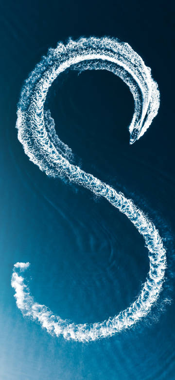 Beautiful wave trails made by a boat