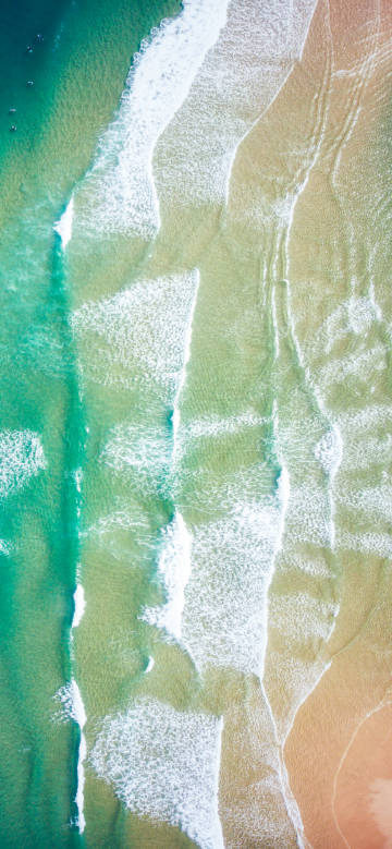 Ocean waves rushing onto the beach