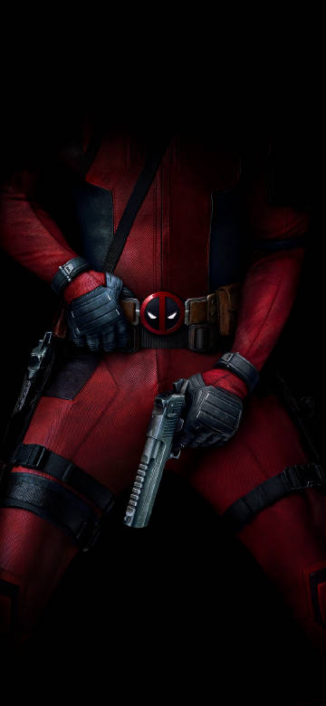 Deadpool showing off gear with a gun