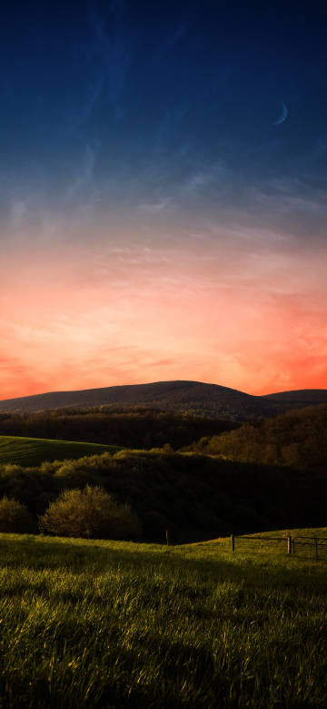 Beautiful hills and grassland at sunset
