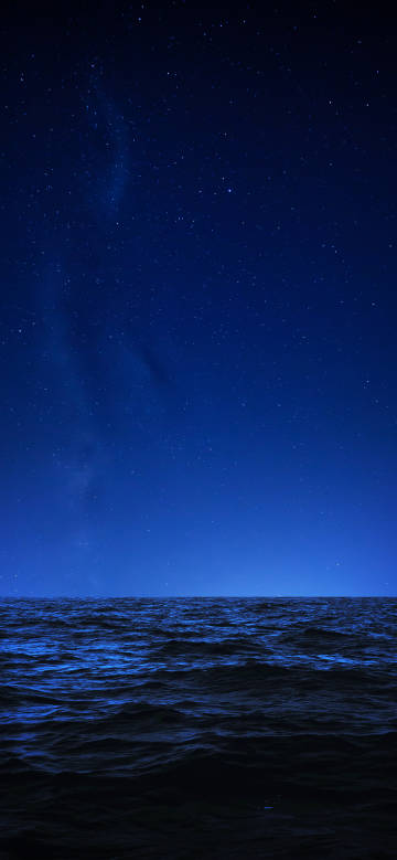 Deep sea under the deep blue starry sky