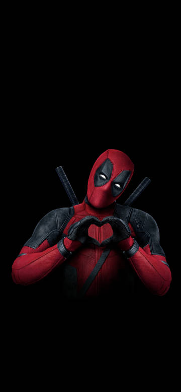 Deadpool making a heart, super cute against black background