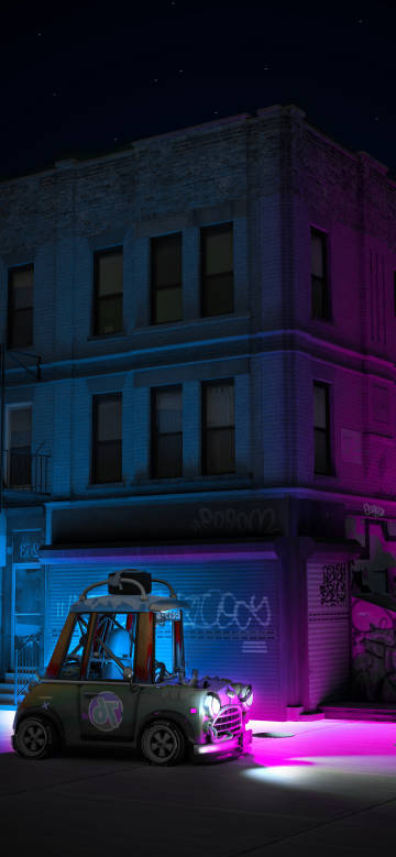 Graffiti building and car on the night street