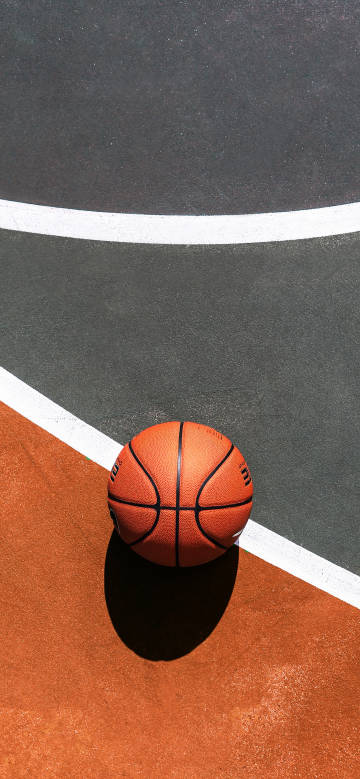 Orange basketball on the basketball court