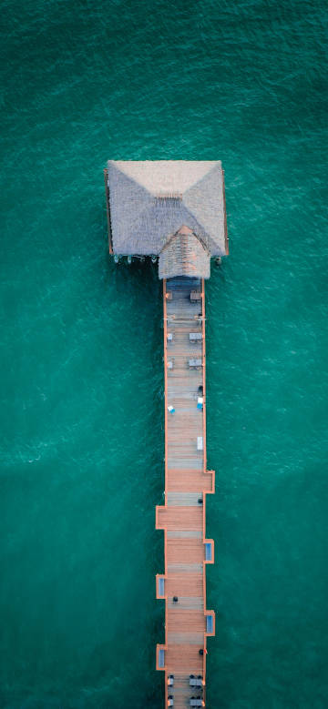 Beautiful scenery of the wooden pier on the sea