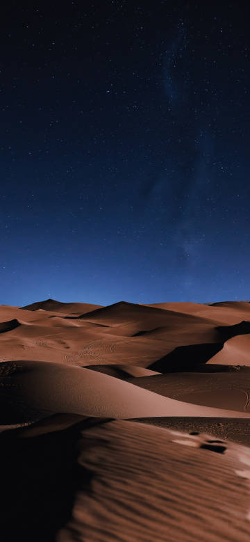 Brilliant starry sky over the desert phone wallpaper