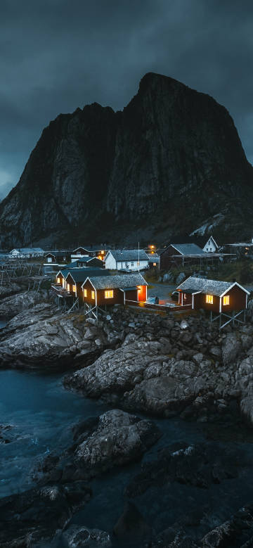 Seaside village under the night sky