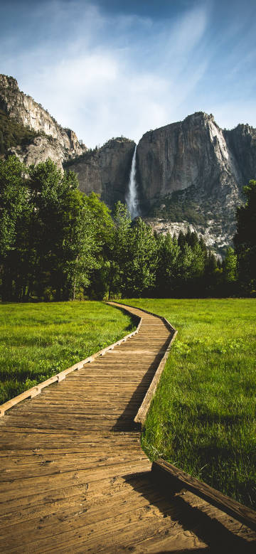 Wooden trail leading to the magnificent waterfall
