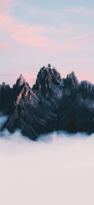 Dreamy peaks amidst clouds