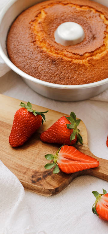 Strawberries on a wooden cutting board