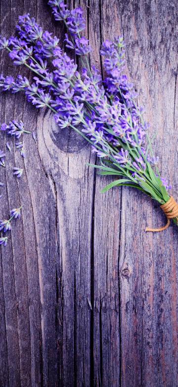 A bouquet of lavender on a wooden board