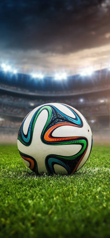 Soccer ball close-up on football field