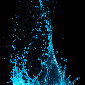 Blue Water Splashes in an Instant 4K Phone Wallpaper